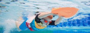 swimmer using kickboard